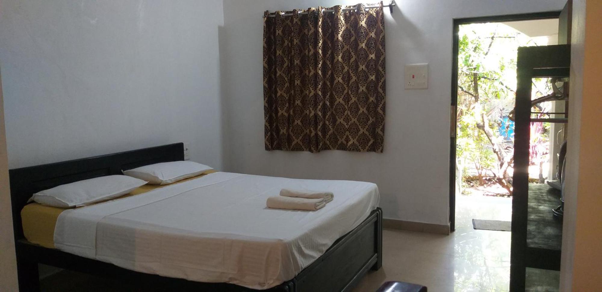 Hotel God'S Gift Morjim Camera foto