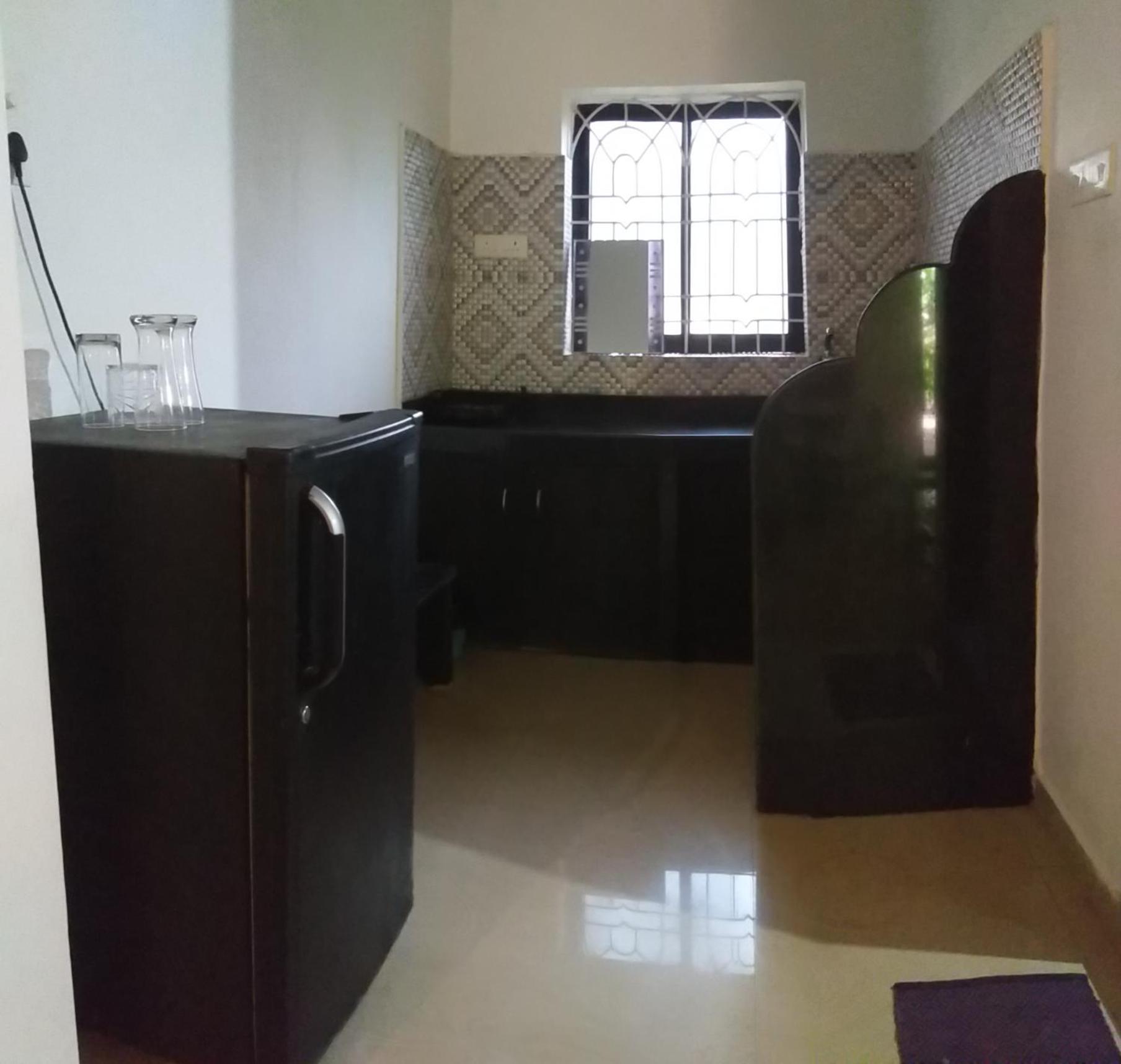 Hotel God'S Gift Morjim Camera foto